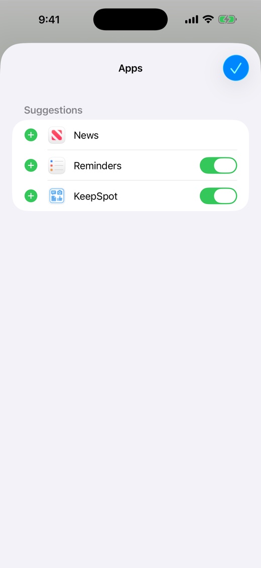 The iPhone Apps screen in edit mode, showing a green plus button next to KeepSpot to add it to Favorites.